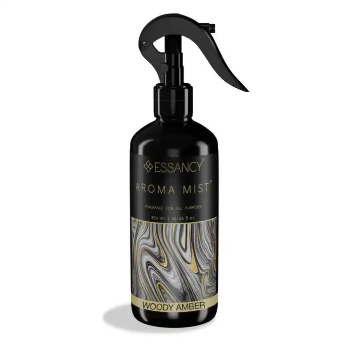 Woody Amber Aroma Mist Air Freshener 300ml in sleek black spray bottle with marbled label design, ideal for odor elimination in home or office.