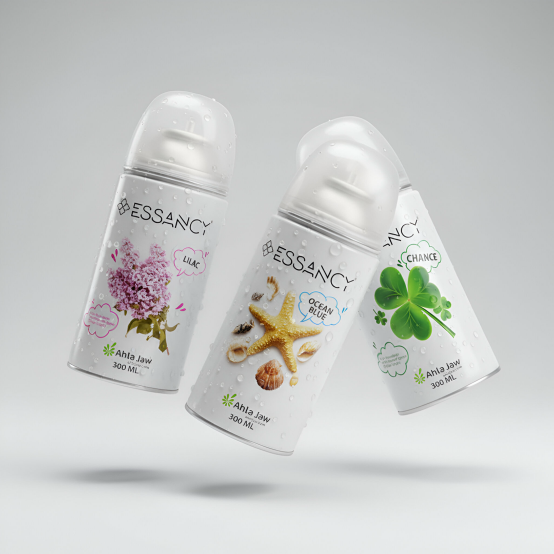 Three Essancy spray bottles with different designs on a gray background